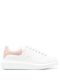 White oversize trainers with pink suede detailing