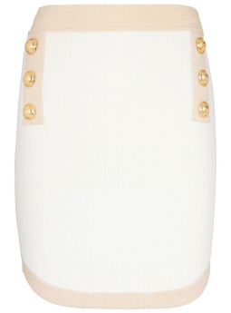 White pencil skirt with buttons and gold trim