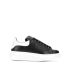 Oversized black trainers with white detailing on the heel