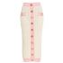 Pink and white midi cable-knit skirt with gold-tone buttons