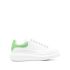 White oversized trainers with green suede detailing