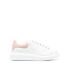 White oversize trainers with pink suede detailing