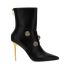 Black ankle boots with decorative buttons and gold heel