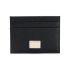Black leather card holder with gold logo plaque
