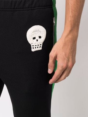 Black sports trousers with skull