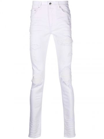 Jeans con effetto vissuto bianchi