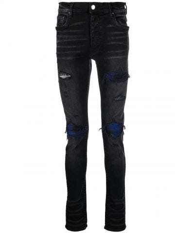 Black distressed skinny jeans