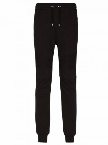 Pantaloni tuta neri in cotone con stampa monogramma Balmain Paris dorata