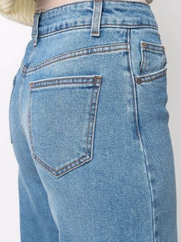 High-waisted jeans with wide legs and inverted hems