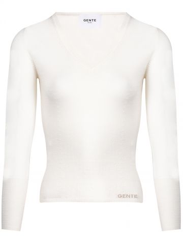 Cream V-neck sweater 
long sleeves