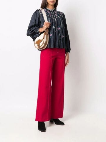 Red high-waisted flared trousers