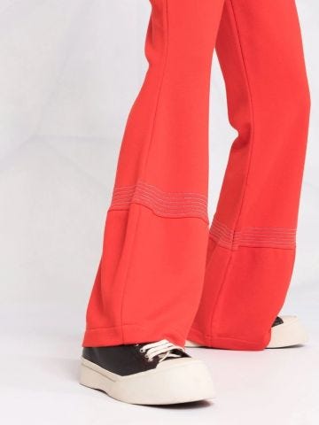 Red flared sports trousers