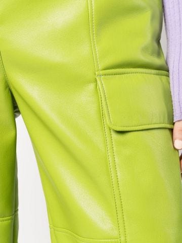 Green leather trousers with ankle ties