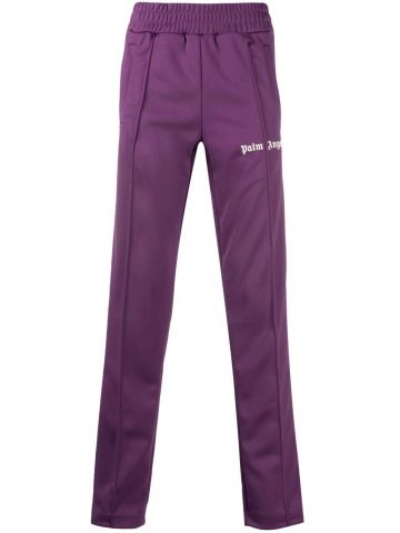 Purple trousers with logo