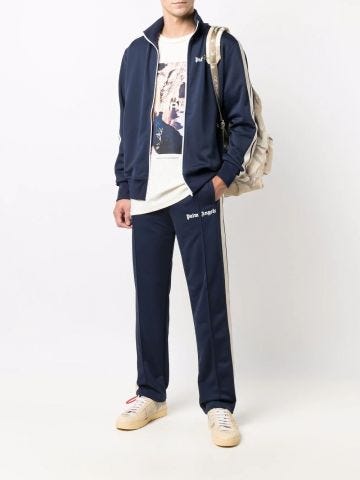 Navy blue track pants with logo