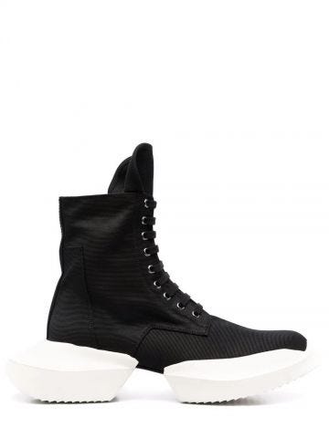 Black sneaker-style lace-up boots