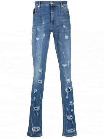 Blue skinny jeans with worn effect