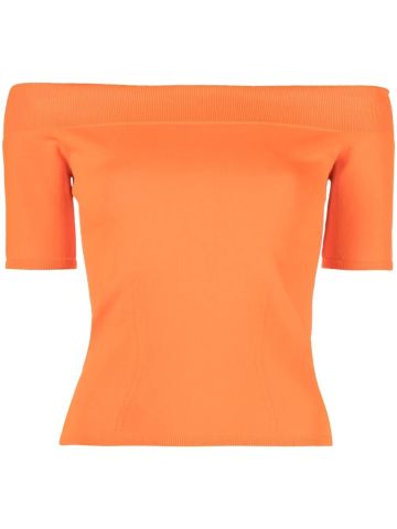 Orange knit top with three-quarter sleeve with bare shoulders