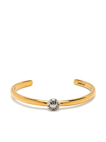 Rigid bracelet with gold pendant