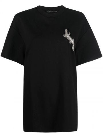 T-shirt nera con spalle scese e cristalli