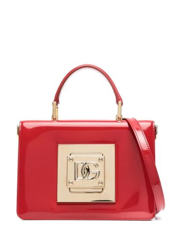 Red tote bag with shoulder strap and DG logo plaque