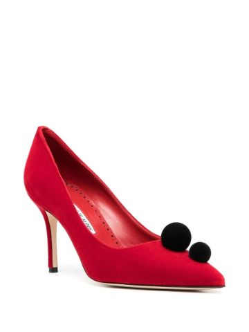 Red Piera pumps embellished with pompoms