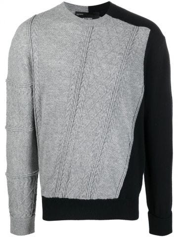 Black and grey two-tone cable-knit jumper