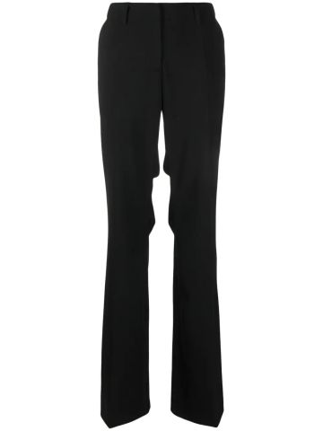 Black tailored trousers with yellow logo patch on the back