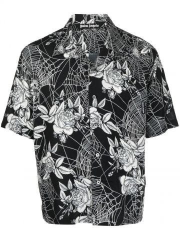 Camicia nera a maniche corte con stampa a fiori e ragnatele bianca