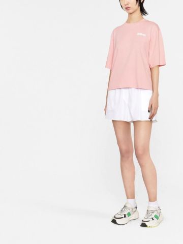 Pink short sleeve T-shirt with logo print on the back