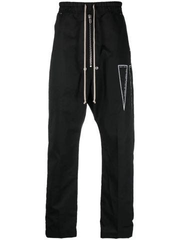 Black pants with low crotch and printed logo