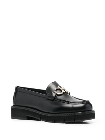 Black loafers with Gancini plaque