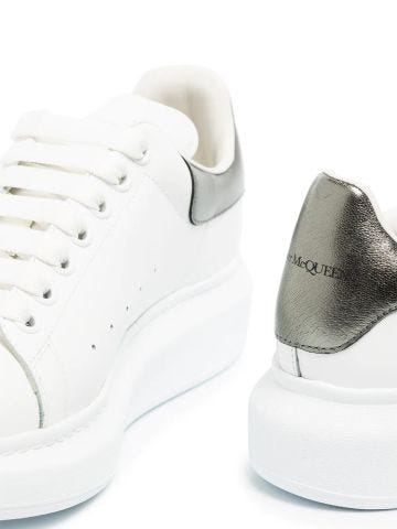 Oversized white sneakers with metallic silver contrast detail