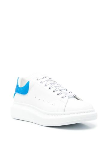 Oversize white trainers with contrasting blue heel