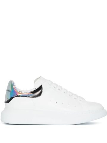 Oversized white sneakers with contrasting metallic silver heel