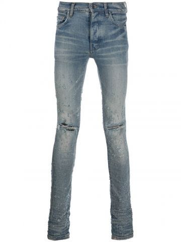 Blue distressed-finish ripped skinny jeans