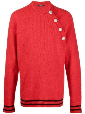 Maglione rosso con bottoni goffrati