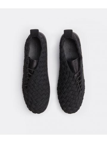 Black elastic lace-up trainers with woven pattern