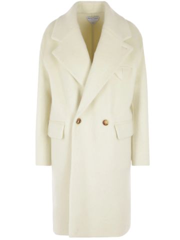 Ivory double-breasted coat with buttons and front pockets