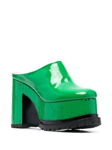 Glossy green mules with wide heel and platform