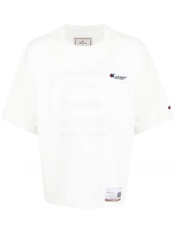 T-shirt bianca in cotone con stampa grafica