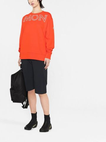 Orange crewneck sweatshirt with logo print