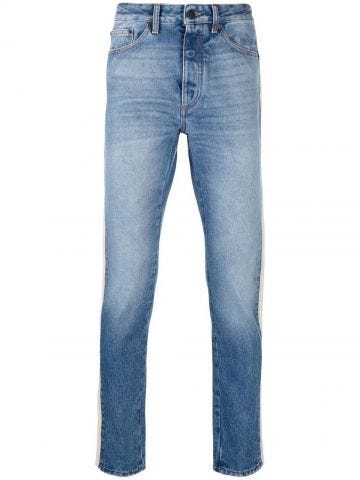 Jeans slim azzurri con banda laterale