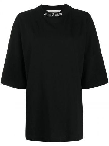T-shirt oversize nera con stampa logo