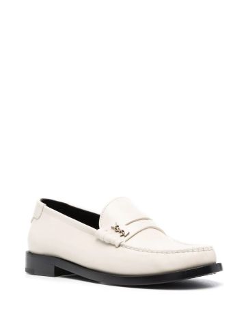 White monogrammed loafers