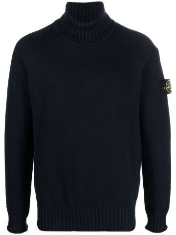 Turtleneck blue sweater with Compass logo applique