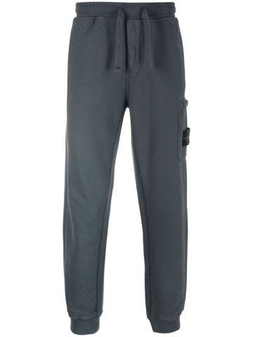 Powder blue sport pants with Compass patch