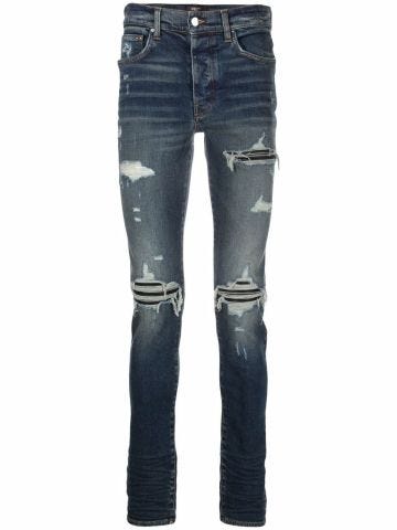 Jeans skinny con effetto vissuto