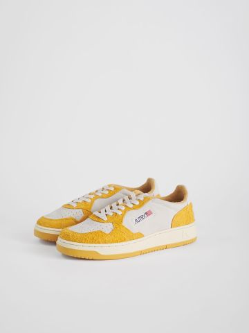 Medalist low white trainers with orange suede inserts