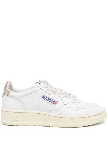 Medalist low white and gold leather trainers